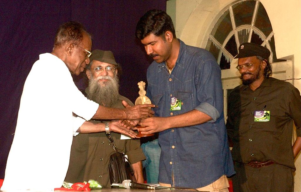 Receiving Award from Late. Sukumar Azhikode